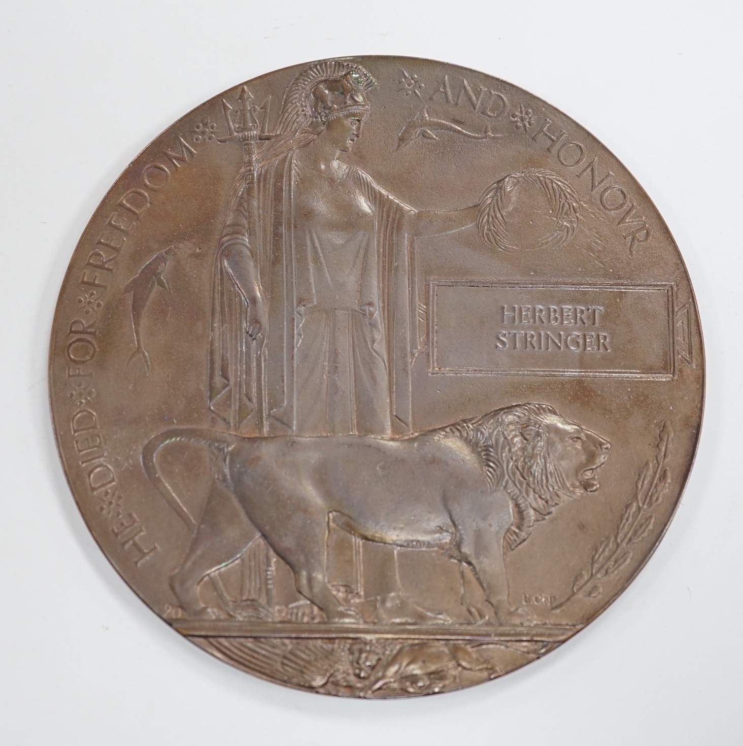 A WWI death plaque for Herbert Stringer, cased